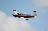 N9135Z @ MIA - Mooney M20J - by Florida Metal