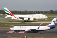 TC-SEE @ EDDL - B737 in front of A380 - by Günter Reichwein