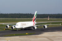 A6-EEY @ EDDL - On the way to Terminal C - by Günter Reichwein
