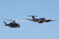 AS1126 @ LMML - Hawker Beechcraft B200 AS1126 flying in formation with Agusta Westland AW-139 AS1428 of the Armed Forces of Malta performing during the Malta International Airshow 2015. - by Raymond Zammit