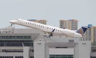 N24103 @ MIA - United Express E145XR - by Florida Metal