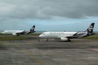 ZK-OXF @ NZAA - ZK-OXF just pushed back, while ZK-OXA just landed and taxies to the gate - by Micha Lueck