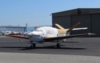 N555E @ KRHV - Locally-based 1959 Beechcraft K35 Bonanza sitting on the Aerodynamic Aviation ramp at Reid Hillview Airport, San Jose, CA. - by Chris Leipelt