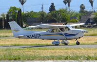 N446SP @ KRHV - Locally-based 1999 Cessna 172S landing runway 31R at Reid Hillview Airport, San Jose, CA. - by Chris Leipelt