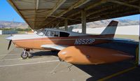 N6523P @ KRHV - Locally-based 1959 Piper Comanche (with tip-tanks) sitting at its tie down under the shelters at Reid Hillview Airport, San Jose, CA. - by Chris Leipelt
