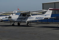 N458SP @ KSQL - San Carlos Flight Center 1999 Cessna 172S Skyhawk parked @ San Carlos Airport, CA home base - by Steve Nation