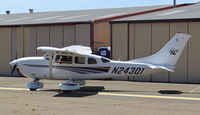 N24301 @ KRHV - Locally-based 1999 Cessna T206H taxing out from its hangar for departure at Reid Hillview Airport, San Jose, CA. - by Chris Leipelt