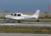 N402CK @ KSQL - Locally-based 2009 Cirrus Design SR22 Turbo rolling on takeoff @ San Carlos Airport, CA - by Steve Nation