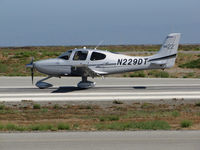 N229DT @ KSQL - Locally-based 2012 Cirrus Design SR22 rolling on takeoff @ San Carlos Airport, CA - by Steve Nation