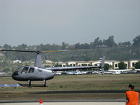 N7106Z @ CMA - 2014 Robinson R44 RAVEN II, Lycoming IO-540-AE1A5 245 Hp, liftoff selling rides - by Doug Robertson