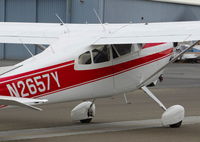 N2657Y @ KRHV - Locally-based 1962 Cessna 180E taxing back to its tie down after maintenance at Reid Hillview Airport, San Jose, CA. - by Chris Leipelt