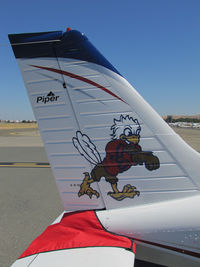 N751LU @ KCCR - Liberty University 2013 Piper PA-28R-201 Cherokee Arrow III took part in 2014 Air Race Classic as race #14. Photo @ Buchanan Field, Concord, CA prior to start of the annual cross country event. Close-Up tail showing Liberty's Sparky the Eagle logo. - by Steve Nation