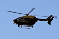 G-DCPB @ EGFH - EC-145, CPAS, call sign Police 09, Exeter-Middlemoor based, previously D-HMBZ, seen in a search pattern over the Sketty \ Dunvant areas of Swansea. Shot taken into very bright evening sun. - by Derek Flewin