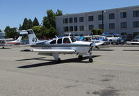 N599DS @ KCCR - Ventura County, CA-based 1967 Beech E33A Bonanza arriving for the 2014 Air Race Classic as Race #40. Photo at Concord, CA prior to start of the cross country event. Pilots were Lucia Gaigano and Judy Phelps aka Team Juci. - by Steve Nation