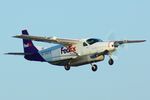 N795FE @ KTVC - Departing RWY 28