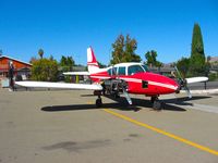 N4921P @ KRHV - Locally-based 1962 Piper Aztec (with both engine cowlings removed) sitting on the Victory Aero ramp for major inspection at Reid Hillview Airport, San Jose, CA. - by Chris Leipelt