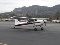 N274MD @ SZP - 1975 Cessna 180J SKYWAGON. Continental O-470-S 230 Hp, taxi off Rwy 22 to hangar after Bruce's impressive really short STOL demos. Not much runway needed! - by Doug Robertson