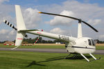 G-CDUE @ EGBR - Robinson R44 Raven at The Real Aeroplane Club's Helicopter Fly-In, Breighton Airfield, September 20th 2015. - by Malcolm Clarke