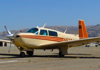 N5764J @ KRHV - Once local 1984 Mooney M20J taxing out for departure at Reid Hilview Airport, San Jose, CA. This is the last picture I have of this aircraft at Reid Hillview, and it's the only one I have of it moving. It's now flying in North Carolina. - by Chris Leipelt