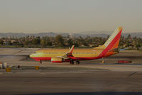 N711HK @ KLAX - Southwest Airlines 1998 Boeing 737-7H4 in old colors taxiing for takeoff @ Los Angeles International airport, CA - by Steve Nation