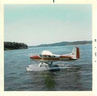 N4585F - N4585 at Lake Of The Ozarks in central Missouri. This plane, then still new, was providing sightseeing rides over the area.   

Photo taken July 1968 with a Kodak Instamatic 104 with the new 126 film cartridge. - by Donald F. Jones