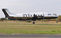 F-GLNK @ EGFH - Visiting Beech 1900D operated by Twin Jet departing Runway 04 for Marseille. - by Roger Winser
