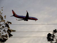 N8612K @ KMKE - SouthWest 737 on approach to 25L KMKE - by MFaulkner