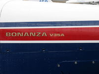 N9000Q @ SZP - 1969 Beech V35A BONANZA, Continental IO-520-B 285 Hp, logo - by Doug Robertson