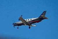 N900JV @ KRHV - Jazen Leasing LLC (Greenwood Village, CO) 2014 Socata TBM-900 landing runway 31R at Reid Hillview Airport, San Jose, CA. - by Chris Leipelt