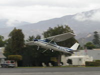 N704UT @ SZP - 1976 Cessna 150M, Continental O-200 100 Hp, takeoff climb Rwy 22 doing pattern work today - by Doug Robertson