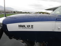 N210HK @ SZP - 1977 Cessna R172K HAWK XP II, Continental IO-360-K rated 195 Hp, 210 Hp with CS tri-blade prop, 131 kts cruise speed, cowl flaps. Logo - by Doug Robertson