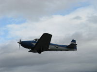 N8667H @ SZP - 1947 North American NAVION, Continental IO-520 285 Hp upgrade, takeoff climb Rwy 22, gear coming up. Aircraft owner gives Young Eagles rides & ALWAYS does a preliminary solo test flight, as photographed. - by Doug Robertson