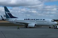 C-FGWJ @ CYXU - Boeing737-700 - by Mark Pasqualino