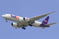 N853FD @ LFPG - Boeing 777-FS2, Short approach rwy 27R, Roissy Charles De Gaulle Airport (LFPG-CDG) - by Yves-Q