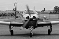 N950CA @ KRHV - Locally-based 1974 Beechcraft V35B Bonanza with beautiful new paint preparing for taxi out and departure at Reid Hillview Airport, San Jose, CA. - by Chris Leipelt