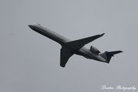 N171GJ @ KSRQ - United Flight 3643 operated by GoJet (N171GJ) departs Sarasota-Bradenton International Airport enroute to Chicago-O'Hare International Airport - by Donten Photography