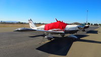 N9130W @ KRHV - R D 235 Inc. (Wilmington, DE) 1966 Piper PA-28-235 sitting on the transient ramp at Reid Hillview Airport, San Jose, CA. - by Chris Leipelt