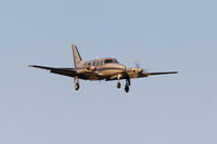 C-GXHK @ CYXX - Landing at sunset - by Guy Pambrun