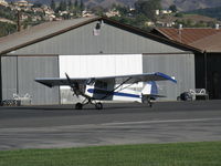 N3257B @ SZP - 1954 Piper PA-18-135 SUPER CUB, Lycoming O-320 upgrade, note larger wings and droop tips, Restricted class aerial advertising, taxi to Rwy 04 - by Doug Robertson