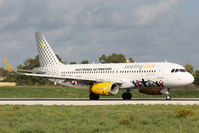 EC-MEQ @ LMML - A320 EC-MEQ Vueling - by Raymond Zammit