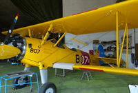 OE-CBM @ LOAV - OE-CBM at Voslau-Wien 15.8.15 marked as 4276 :807 US Navy in Austrian Aviation Musueum hangar - by GTF4J2M