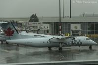 C-GUON @ CYVR - Arriving to gate, C-wing. - by Remi Farvacque
