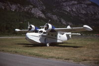 C-FMPG @ CYBD - On the grass at QBC / CYBD, Bella Coola, BC. Note that the paint is substantially different than it is in its museum status. - by Murray Lundberg