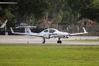 N147TS @ FXE - taxiing to runway 9 - by Bruce H. Solov