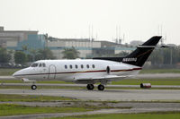 N880RG @ FXE - Taxiing to runway 9 - by Bruce H. Solov