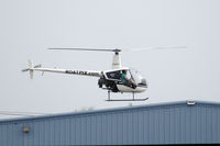 N2663J @ FXE - hovering over the field