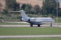 M-YFLY @ LSZH - A bit of a paparazzo shot this as it was parked on the far side of the field and heat haze was very strong - by alanh