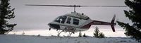 N38MA - dropping us off at a transmitter site for maintenance circa 2000 - by Lin Holcomb