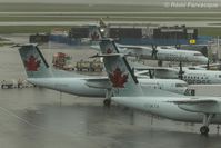 C-GTAQ @ CYVR - Parked in C wing - by Remi Farvacque