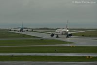 B-2035 @ CYVR - In foreground, taxiing to departure runway. - by Remi Farvacque